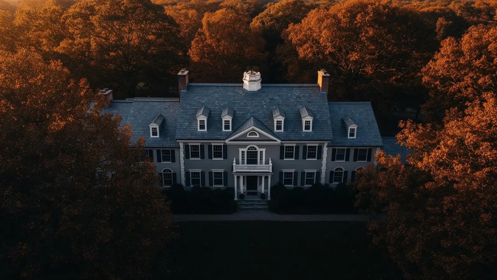 Aerial view of luxury colonial home with slate roof in MetroWest Massachusetts